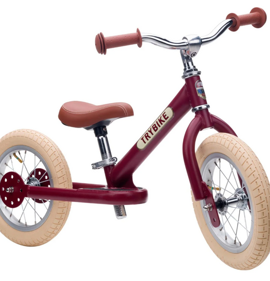 Red balance bike with beige tires. 2-IN-1 TRIKE & BALANCE BIKE - VINTAGE RED | TRYBIKE
