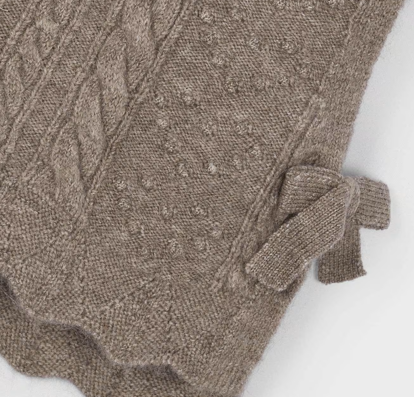 MAYORAL NEUTRAL KNITTED SWEATER VEST WITH BOWS