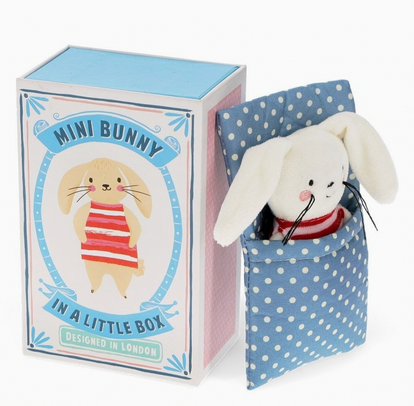 Box open next to closed box; matchbox drawer extended; bunny nestled in blue polka dot blanket pocket; full unboxing reveal