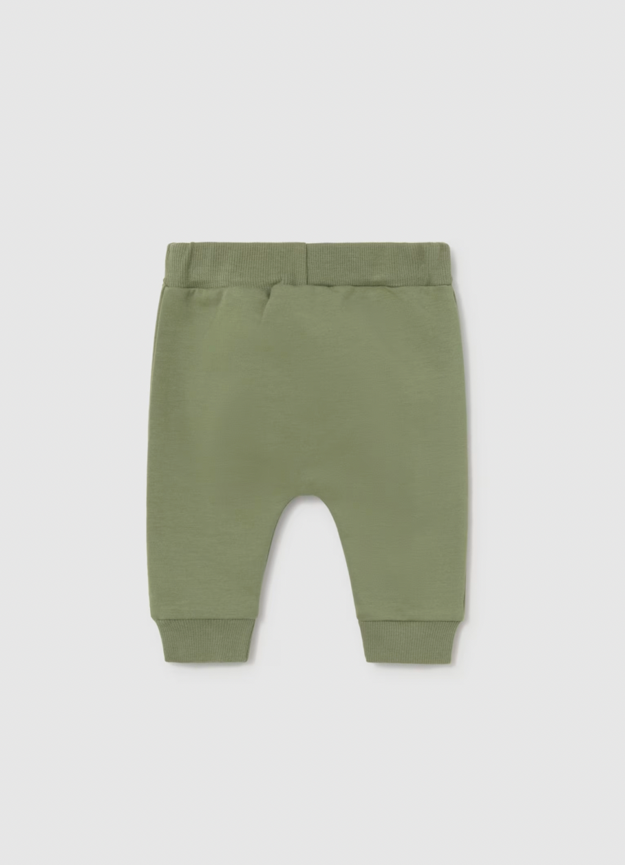 Grey BG trousers back view — clean back, ribbed waist and cuffs, tapered leg