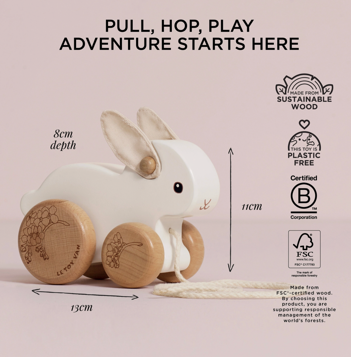 FSC®-certified wooden Pull Along Rabbit by Le Toy Van, a playful first-walker toy with soft felt ears and a hopping movement.