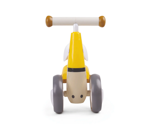 Children's balance bike with yellow body, gray wheels, and white handlebar. TODDLER RIDE ON TOY - GIRAFFE | DIDITRIKE