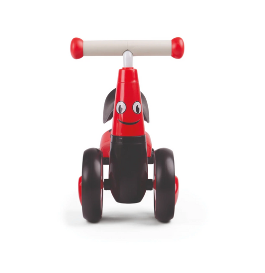 Red and black toy bike with a smiling face on. TODDLER RIDE ON TOY - LADYBIRD | DIDITRIKE