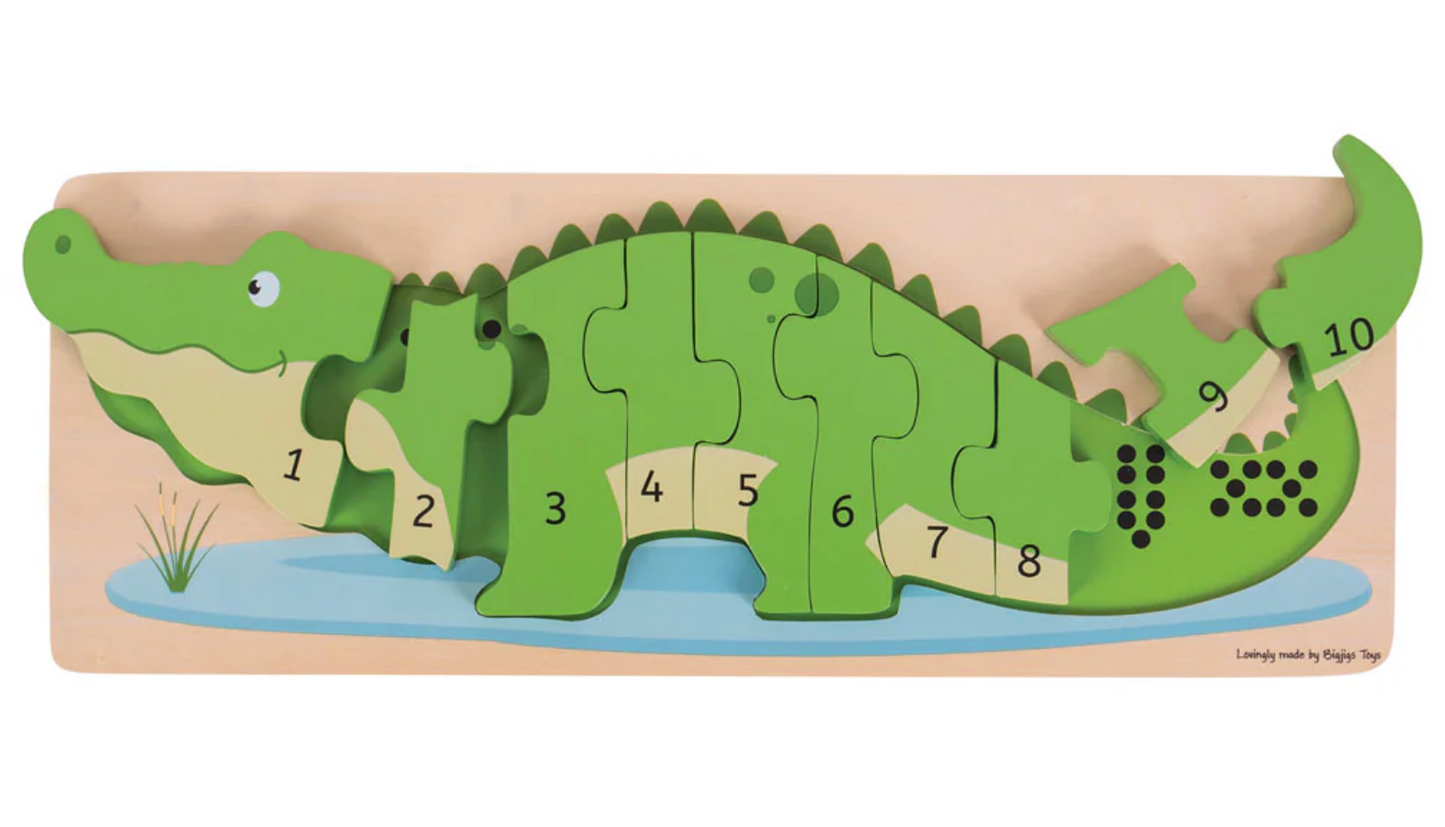 Green alligator-shaped puzzle with numbers. WOODEN CROCODILE NUMBER COUNTING 1-10 PUZZLE | BIGJIGS