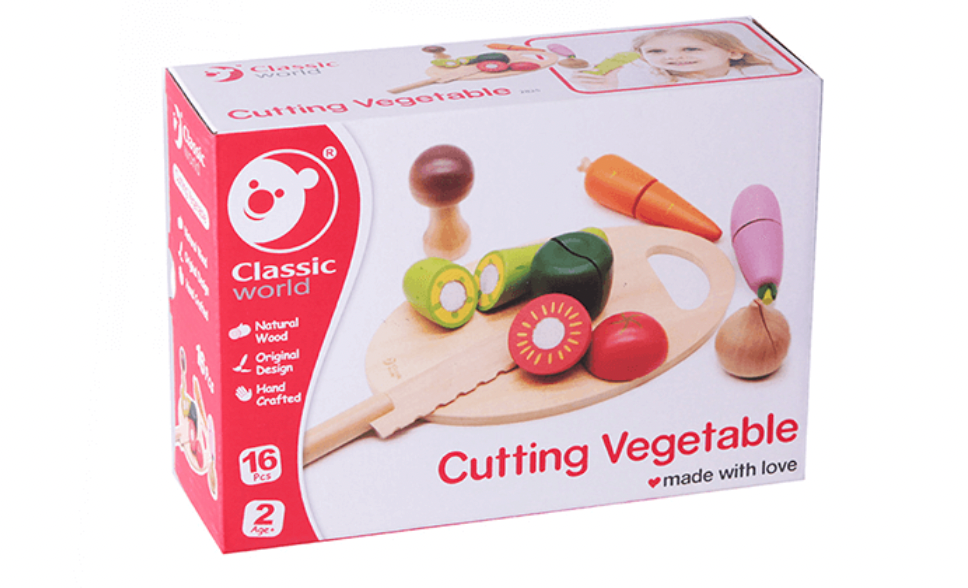 Box of 'Cutting Vegetable' toy set with colorful vegetables and a cutting board on a white background. WOODEN TOY CUTTING VEGETABLES | CLASSIC WORLD