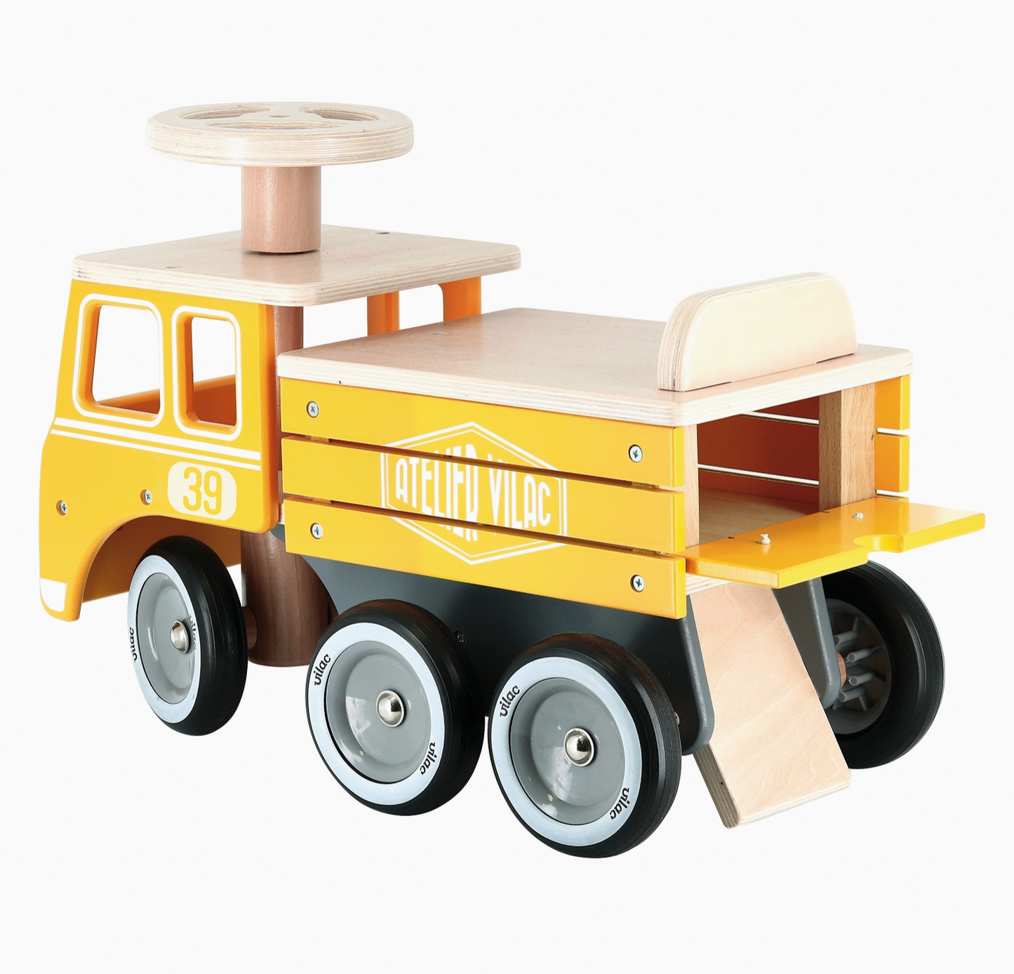 Close-up view of the secret under-seat toy storage compartment on the Vilac wooden construction ride-on truck.