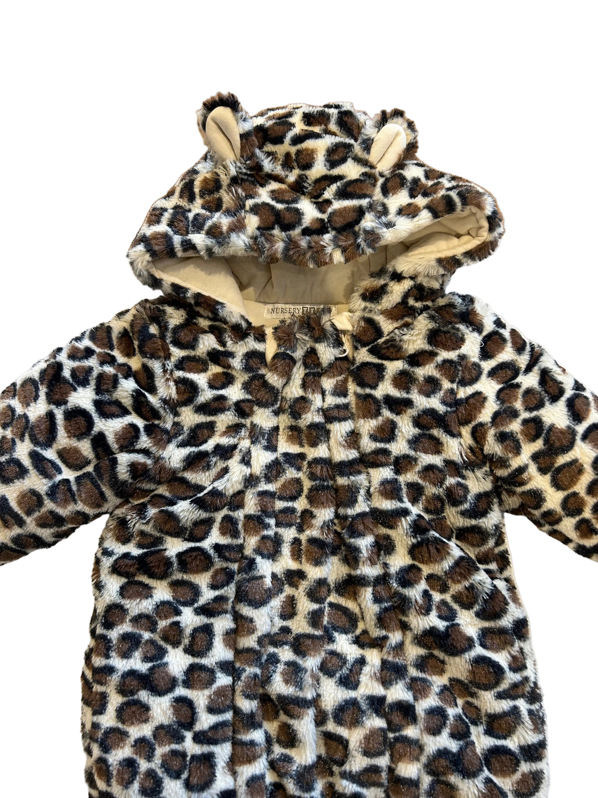 Nursery Time leopard print baby snowsuit — close-up of the fluffy faux fur leopard print hood with 3D ears and cream sherpa lining, showing Nursery Time label at the neck