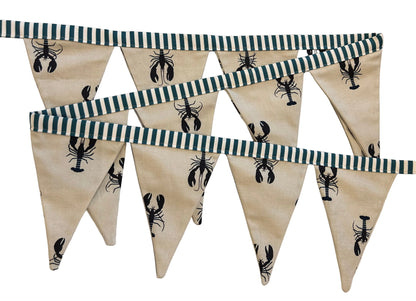 Fabric bunting with striped and black lobster pattern on a white background