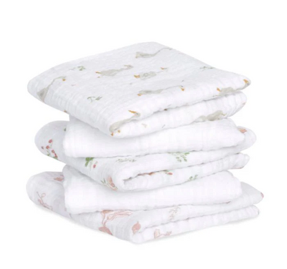 Stack of white baby blankets with subtle patterns. ADEN + ANAIS 5 PACK BABY MUSLIN SQUARES - COUNTRY FLORAL