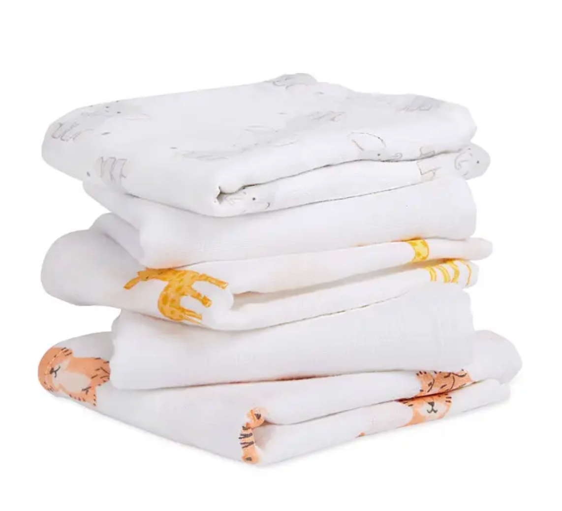 Stack of folded baby blankets with animal patterns. ADEN + ANAIS 5 PACK BABY MUSLIN SQUARES - SAFARI BABES