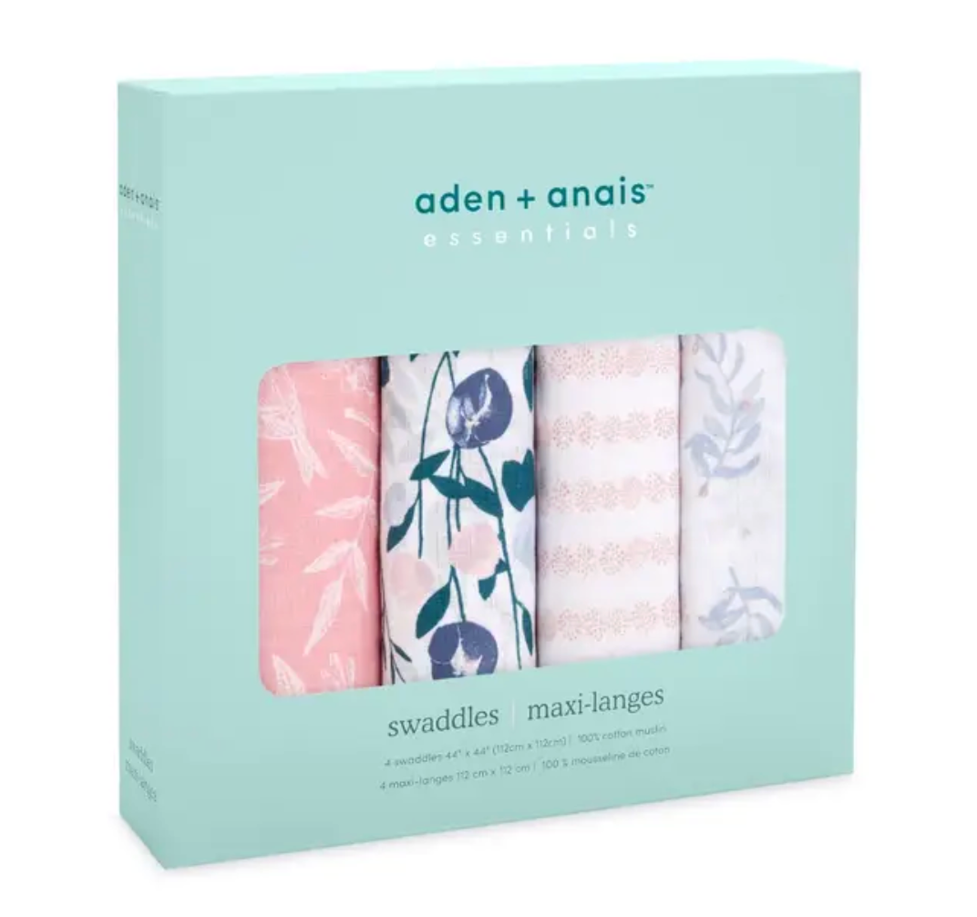 Pack of aden + anais swaddles in a light green box with floral patterns. ADEN + ANAIS COTTON BABY SWADDLE 4 PACK - FLOWERS BLOOM