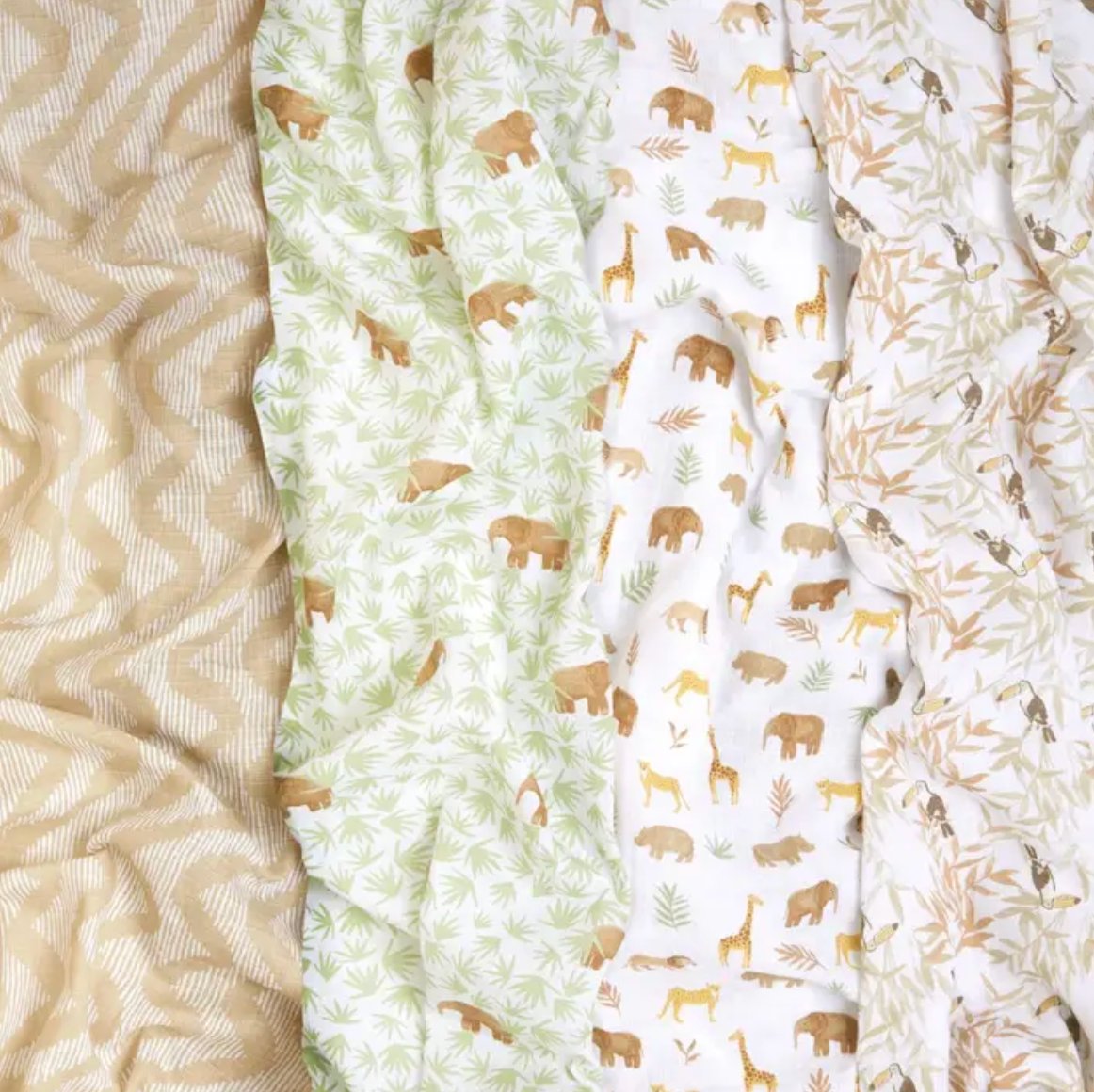 Collection of fabric swatches with animal prints and textured patterns. ADEN + ANAIS COTTON BABY SWADDLE 4 PACK - TANZANIA