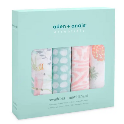 Box of aden + anais swaddles with floral patterns on a light blue background. ADEN + ANAIS COTTON BABY SWADDLE 4 PACK - TROPICALIA