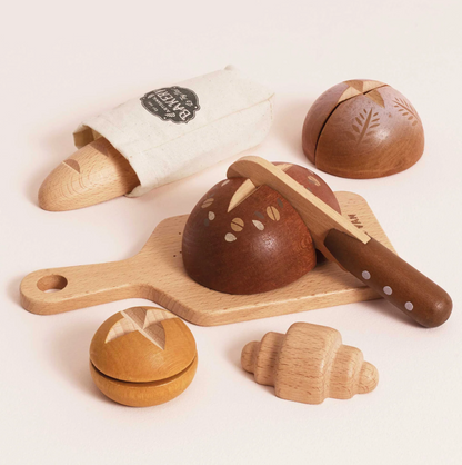 Wooden toy bakery set with various bread shapes on a white background. ARTISAN BREAD AND KNIFE SET WOODEN TOY | LE TOY VAN