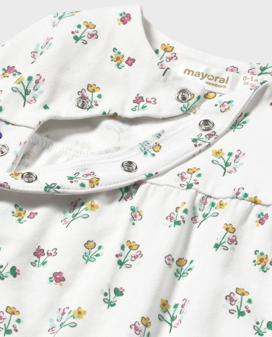 Baby outfit with floral pattern and 'mayoral' branding. BABY GIRL FLORAL SLEEPSUIT WITH FOOT COVERS | MAYORAL 