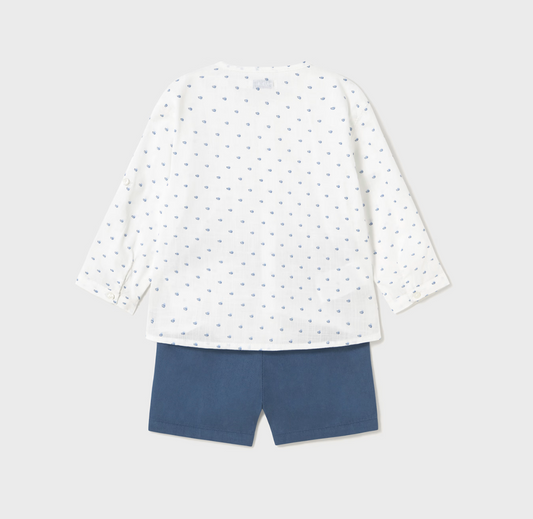 White long-sleeve shirt with small patterns and blue shorts on a light gray background BABY SHORTS WITH PRINT SHIRT SET | MAYORAL 