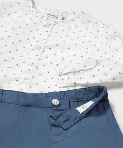 White shirt with blue pattern and blue pants on a white background BABY SHORTS WITH PRINT SHIRT SET | MAYORAL 