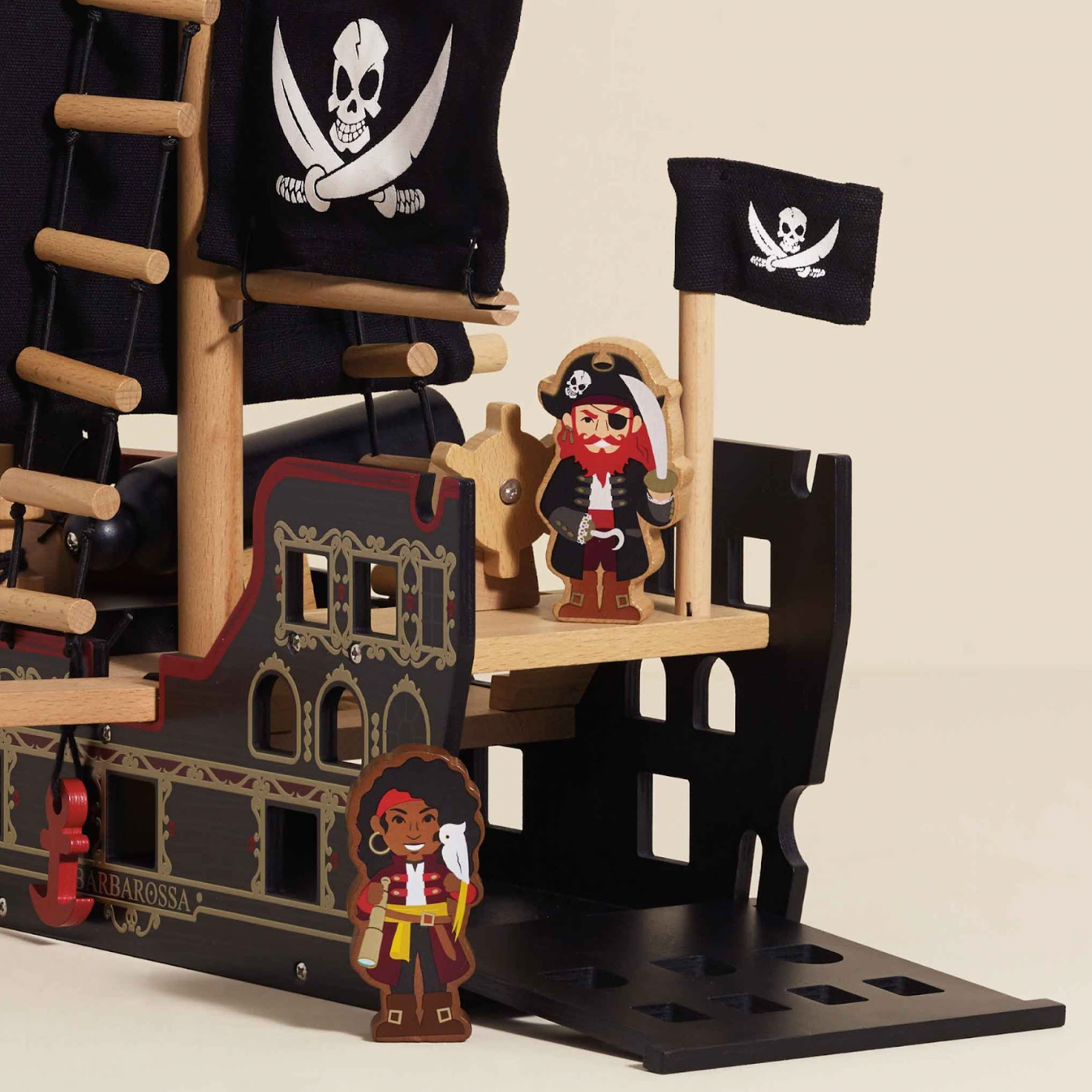 Pirate ship playset with figures and a flag on a beige background BARBAROSSA WOODEN PIRATE SHIP & CHARACTERS | LE TOY VAN 