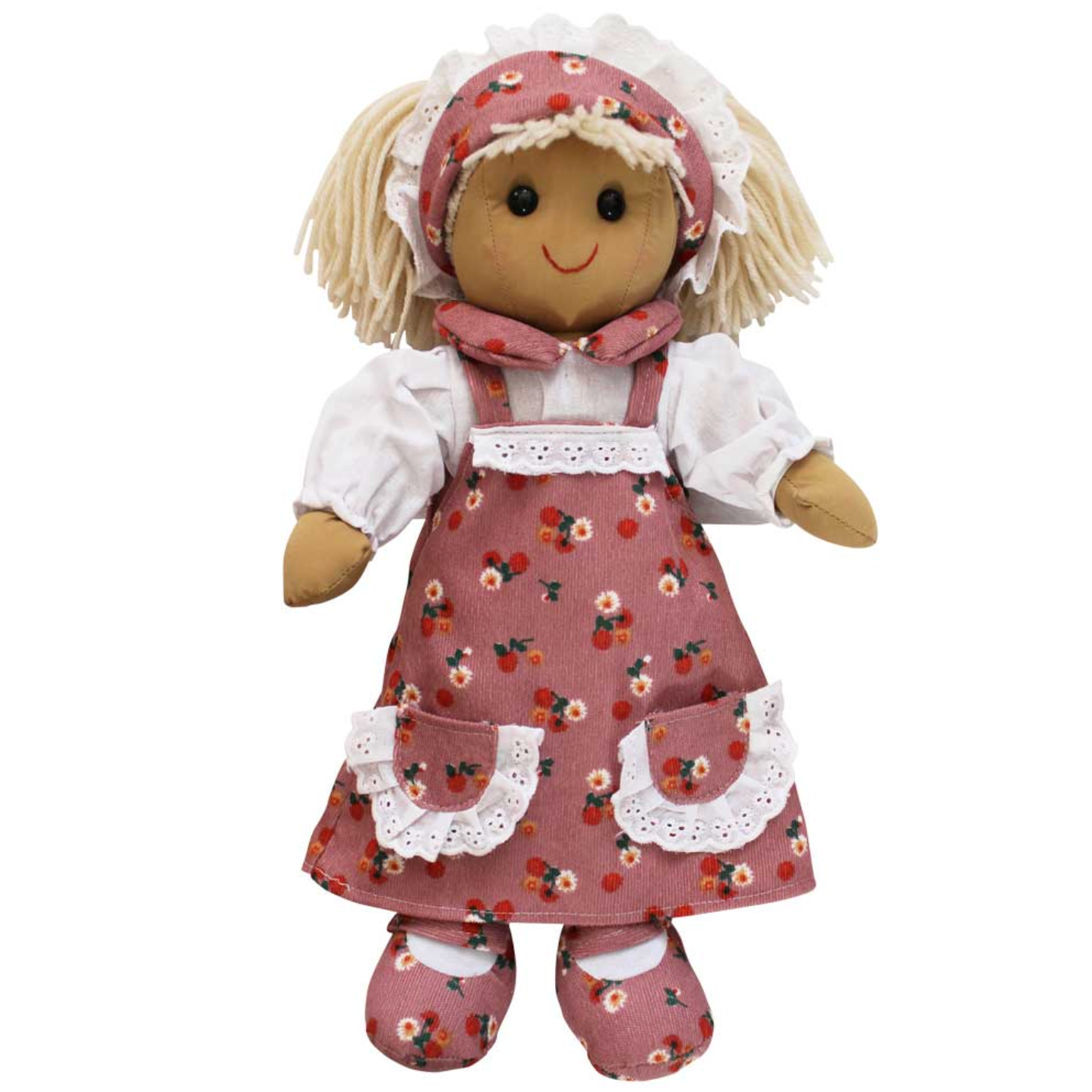 A blonde haired ragdoll wearing a blush pink floral corduroy pinafore dress with white lace trimmed pockets, a white long sleeved shirt with a blush pink floral print cord collar, and matching little pink corduroy shoes. BLONDE BLUSH FLOWER RAGDOLL WITH HEADBAND | POWELL CRAFT