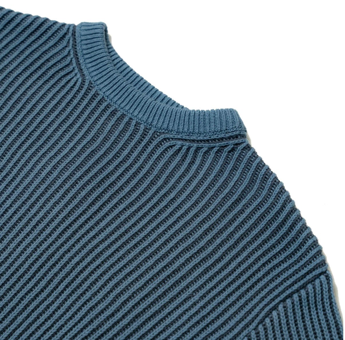 Close-up of a blue ribbed sweater collar. CHILDREN'S CHUNKY KNIT CLASSIC JUMPER | ELEANOR CHARLES
