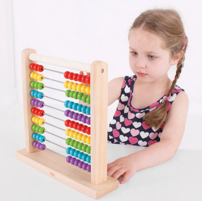 Child playing with bigjigs Colorful childrens educational toy abacus with wooden frame. CHILDREN'S CLASSIC COLOURFUL WOODEN ABACUS | BIGJIGS
