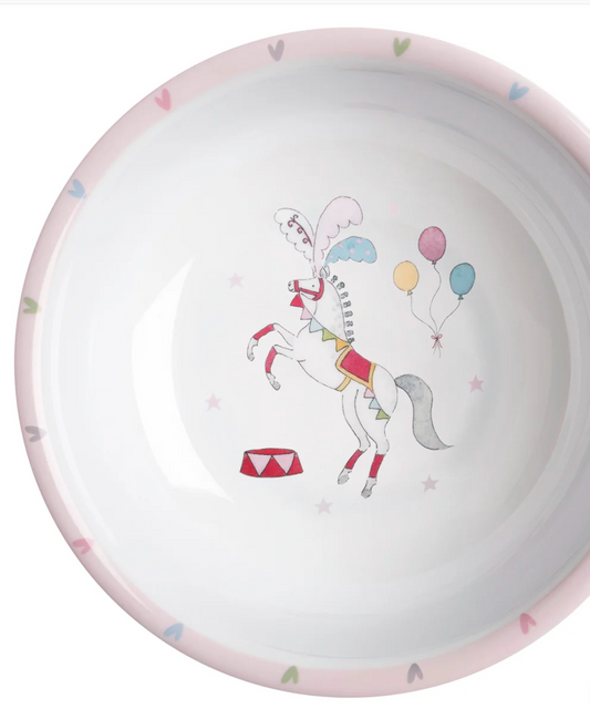 Ceramic bowl with a colorful unicorn design on a white background. CHILDREN'S MELAMINE BOWL - FAIRGROUND PONIES | SOPHIE ALLPORT