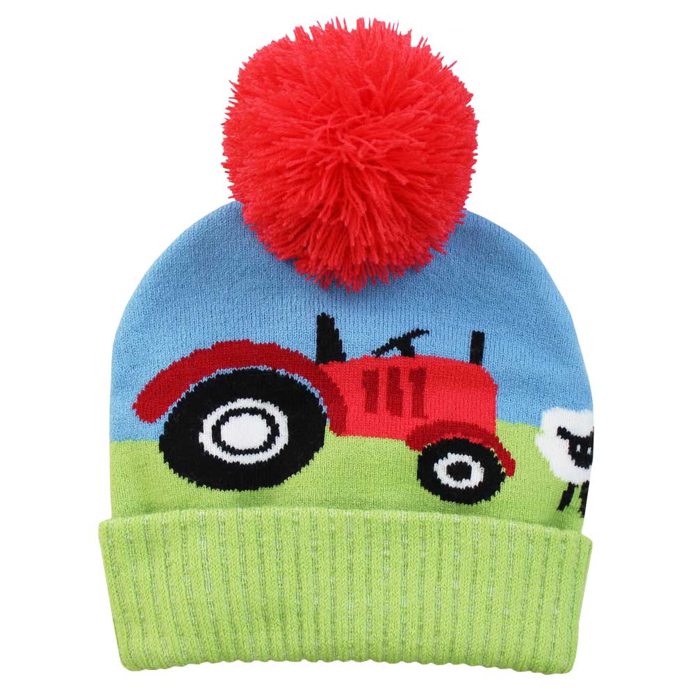 Children's knit hat with red pom-pom, tractor, and sheep design on a blue and green background. CHILDREN'S TRACTOR KNITTED HAT WITH POM-POM | POWELL CRAFT