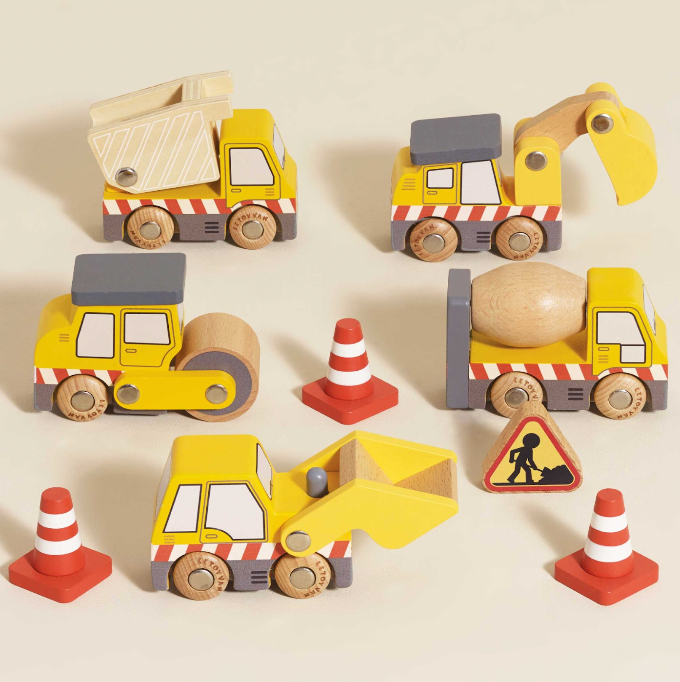 Set of wooden toy construction vehicles on a beige background. CONSTRUCTION WOODEN TOY CARS, TRUCKS & DIGGERS | LE TOY VAN