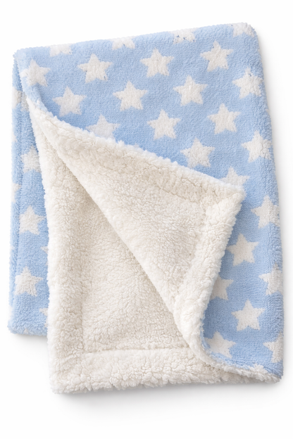 Baby blanket with star pattern on blue side and white sherpa side. COSY BABY WRAP | BLUE FLEECE LINED STAR