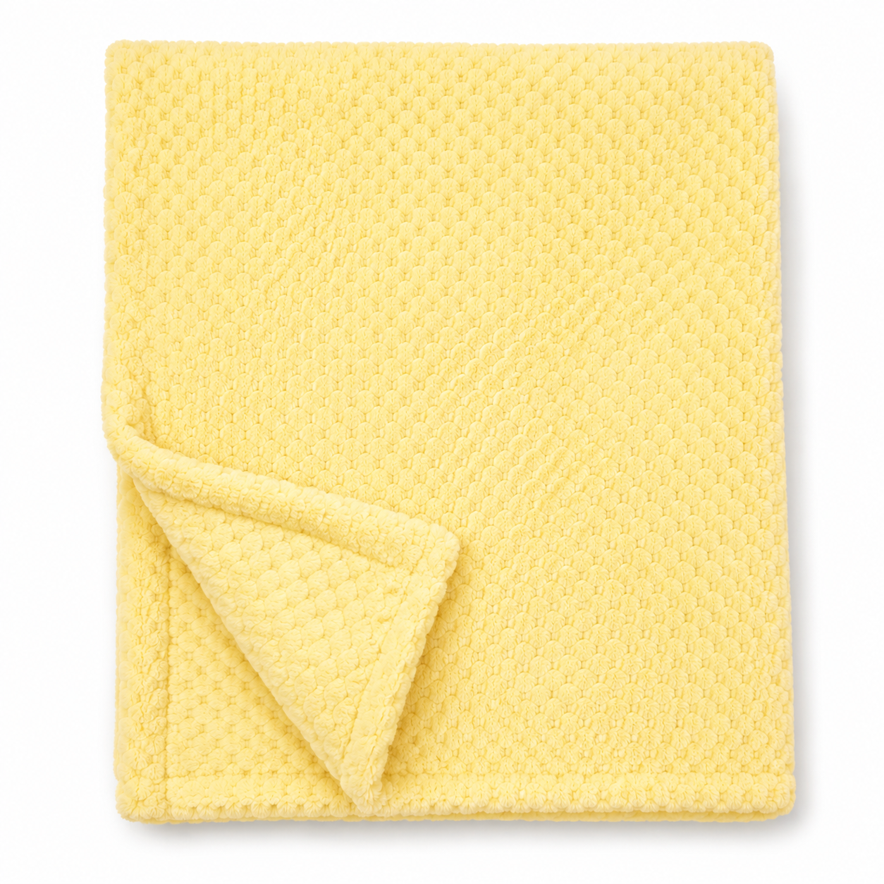 Snuggle Baby lemon yellow cosy baby wrap — folded soft fleece wrap with waffle honeycomb texture throughout in a soft lemon yellow, showing corner turned back to reveal the texture detail, on white background