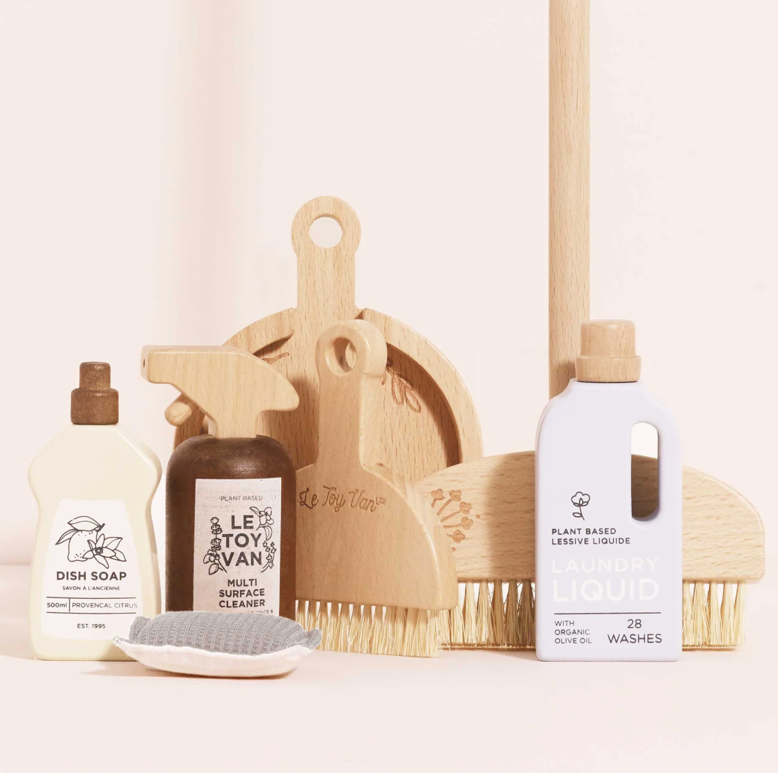 Set of cleaning products including bottles, a brush, and a dustpan on a light background. ECO-FRIENDLY WOODEN TOY CLEANING SET | LE TOY VAN