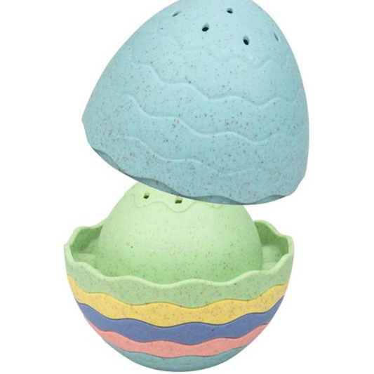 A set of colorful bath toys designed to stack together resembling an egg, with multiple play pieces and small holes at the bottom. ECO STACK & POUR BATH EGG | TIGER TRIBE