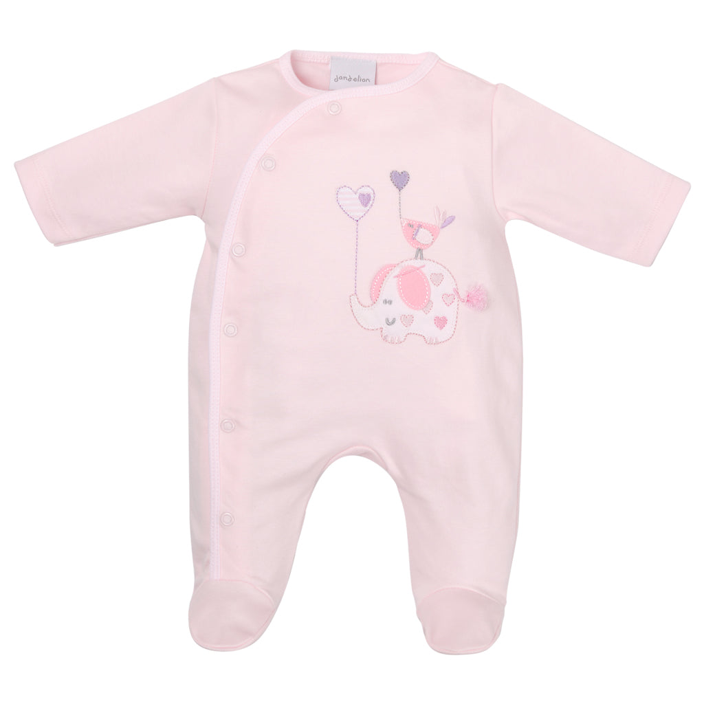 A PINK cotton sleepsuit for babies with an elephant and bird with a balloon print, displayed on a hanger. ELEPHANT & BIRD WITH BALLOON COTTON SLEEPSUIT - BABY PINK | DANDELION