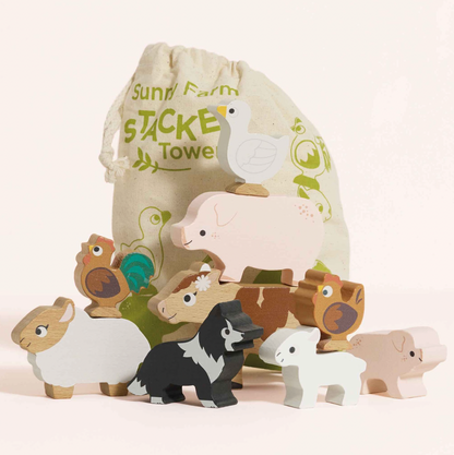 Set of wooden farm animal toys with a drawstring bag labeled 'Sunny Farm' on a light background. FARMYARD STACKING WOODEN ANIMALS & BAG | LE TOY VAN