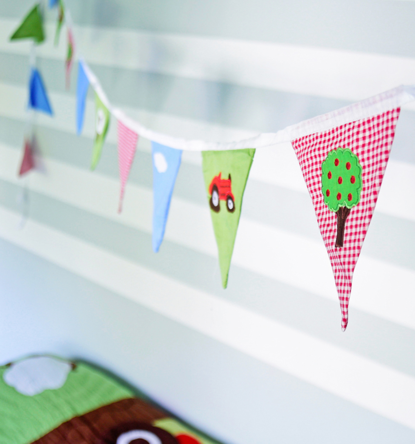 Colorful fabric bunting with cartoon designs. FARMYARD THEMED BUNTING FOR BEDROOM & PARTY DECORATION | POWELL CRAFT