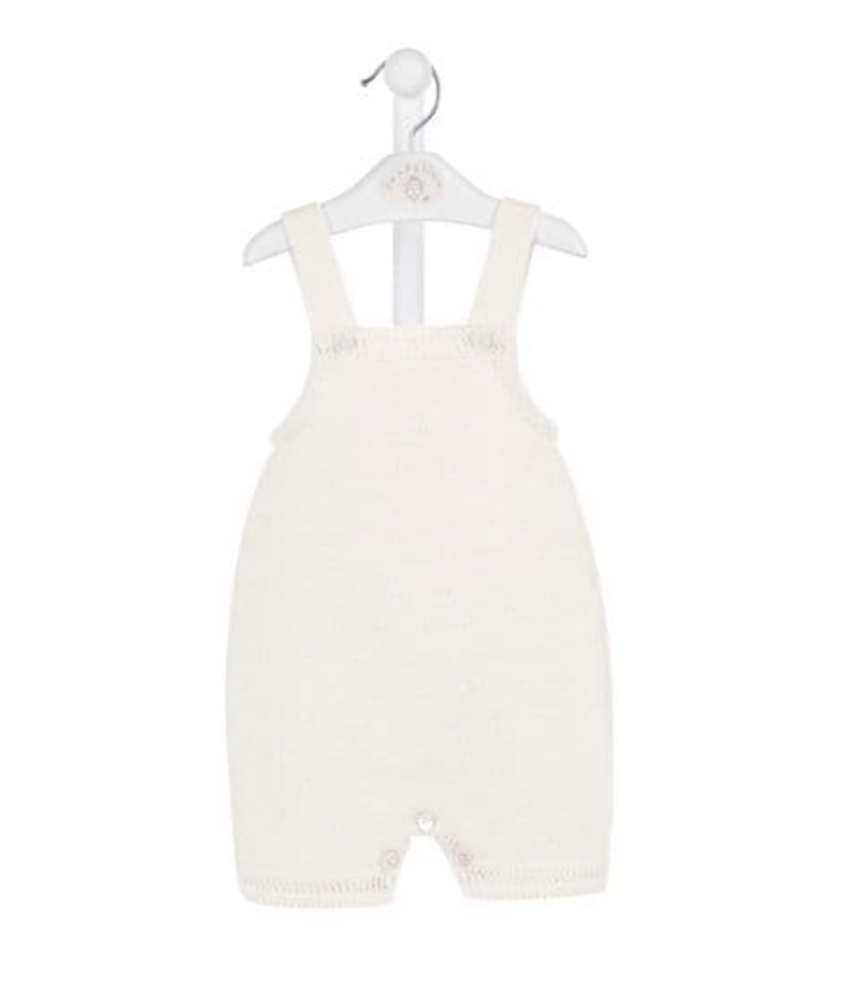 White baby romper on a hanger against a white background. FINE KNIT BABY ROMPER - CLASSIC WHITE | DANDELION