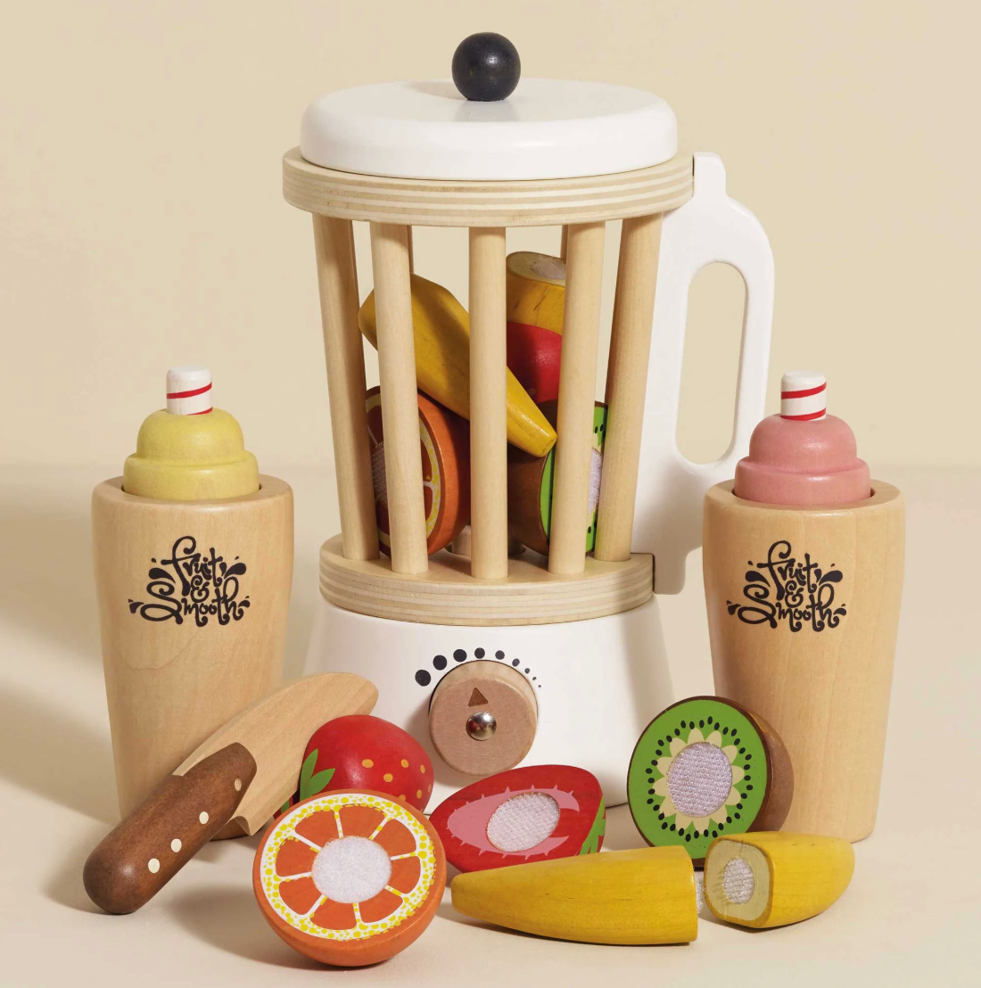 Wooden toy kitchen set with fruits and a blender on a beige background. FRUIT & SMOOTHIE WOODEN TOY BLENDER SET | LE TOY VAN