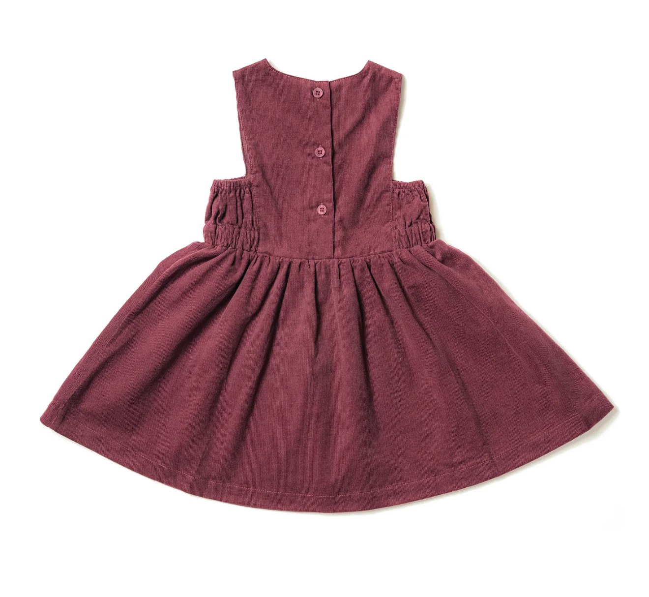 Maroon dress with buttons on a white background. GIRLS BURGUNDY CORD PINAFORE DRESS | ELEANOR CHARLES