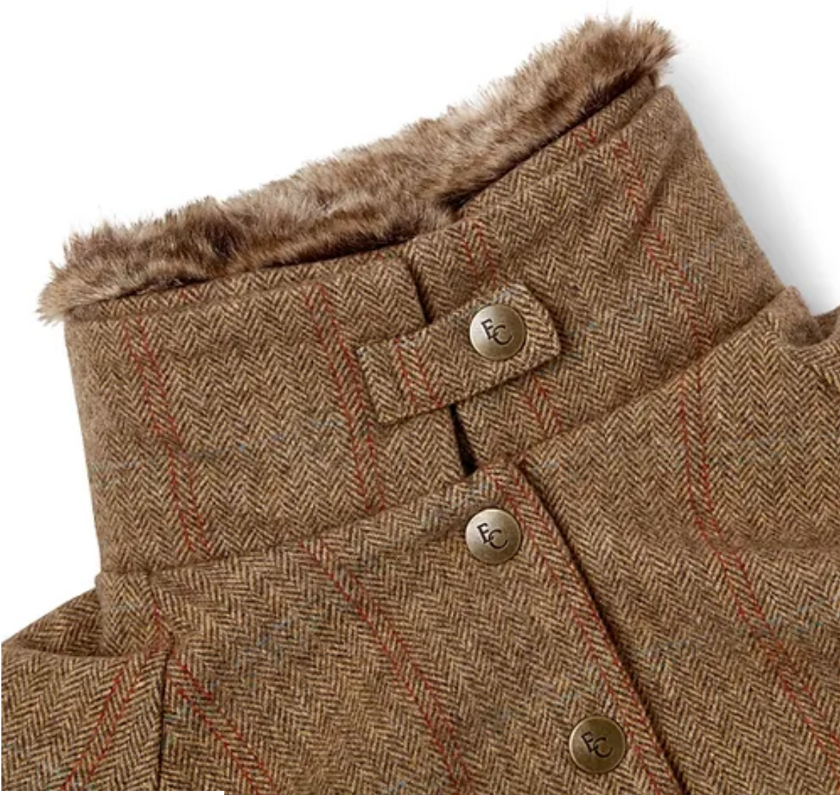 Close-up macro — herringbone tweed texture, EC-embossed brass poppers in sharp detail