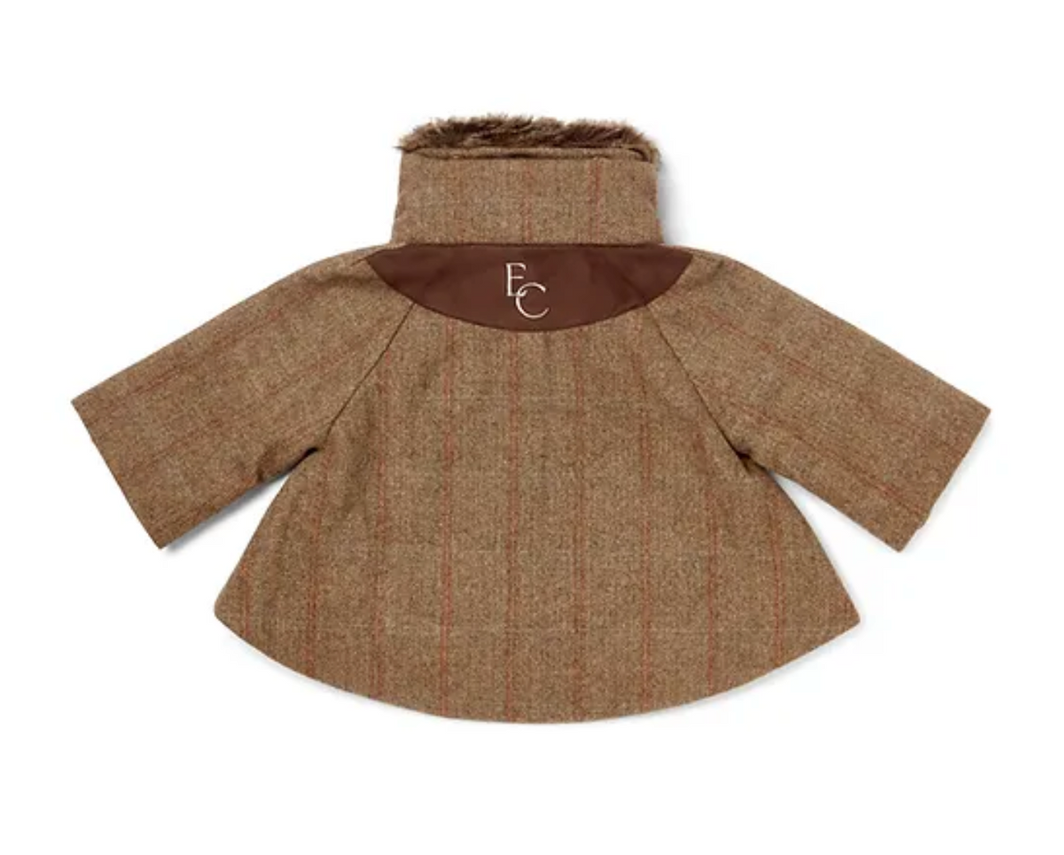 Rear flat-lay — the half-moon faux suede yoke with EC monogram, the defining back detail