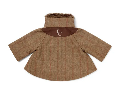 Rear flat-lay — the half-moon faux suede yoke with EC monogram, the defining back detail