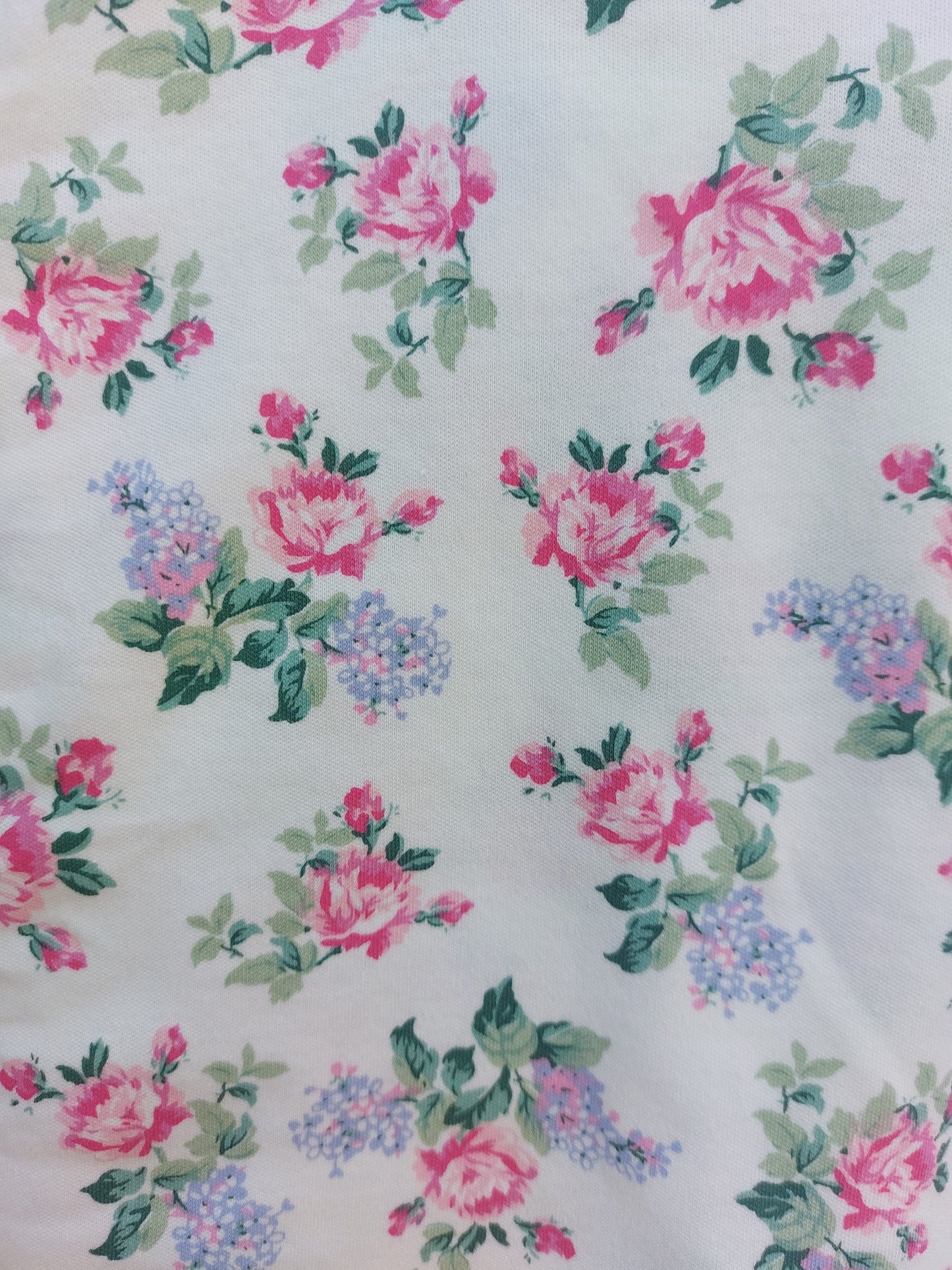 Floral patterned fabric with pink and purple flowers on a white background. GIRL'S ENGLISH GARDEN FLOWER COTTON TOP & BOTTOM PYJAMAS - 3 SIZES | POWELL CRAFT