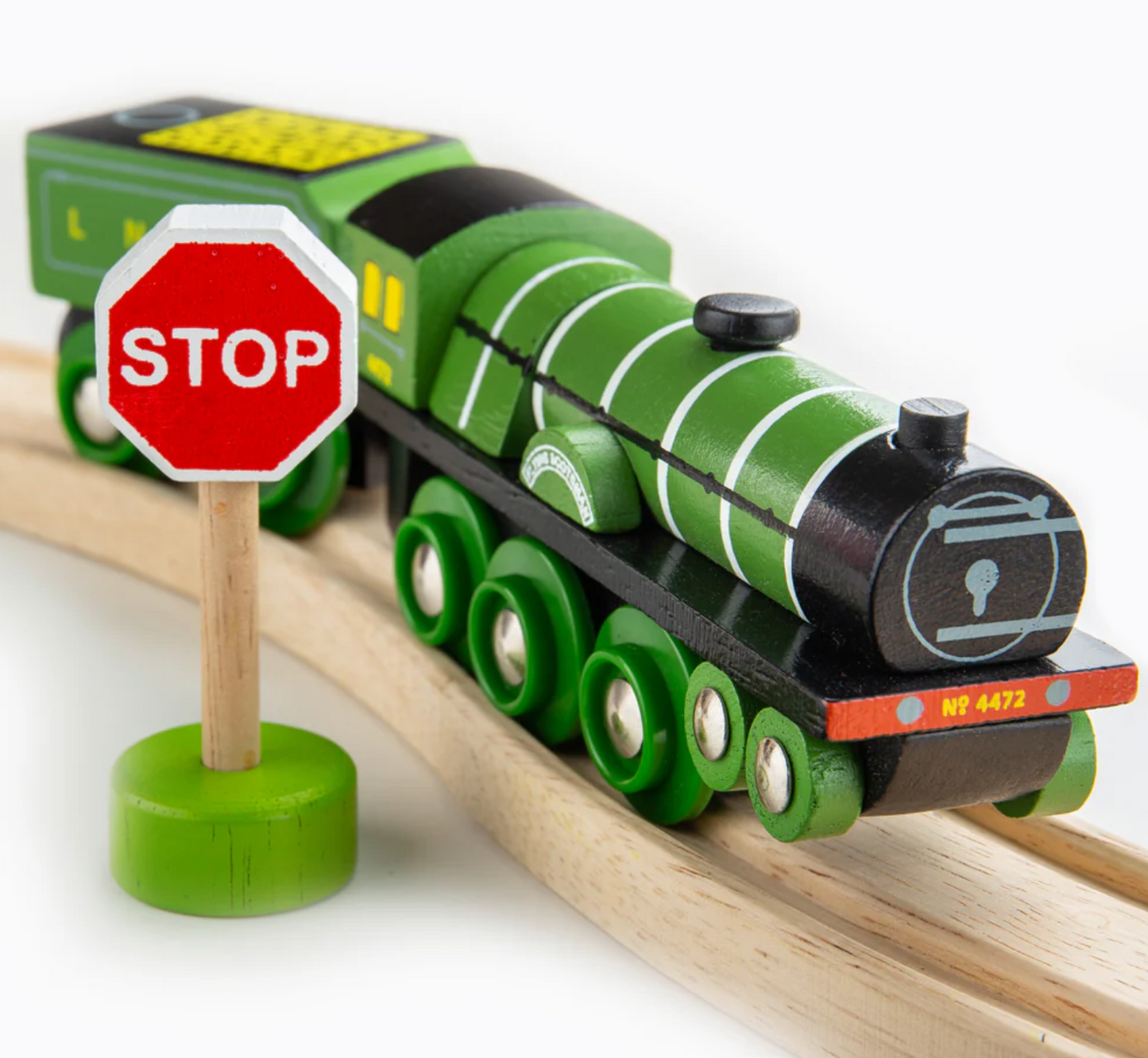 Toy train with a stop sign on wooden tracks. HERITAGE COLLECTION FLYING SCOTSMAN WOODEN TRAIN | BIGJIGS RAIL