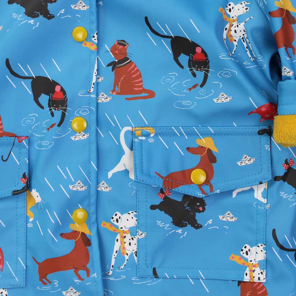 Blue raincoat with cartoon dogs and cats pattern.  IT'S RAINING CATS & DOGS LINED RAINCOAT - 4 SIZES | POWELL CRAFT