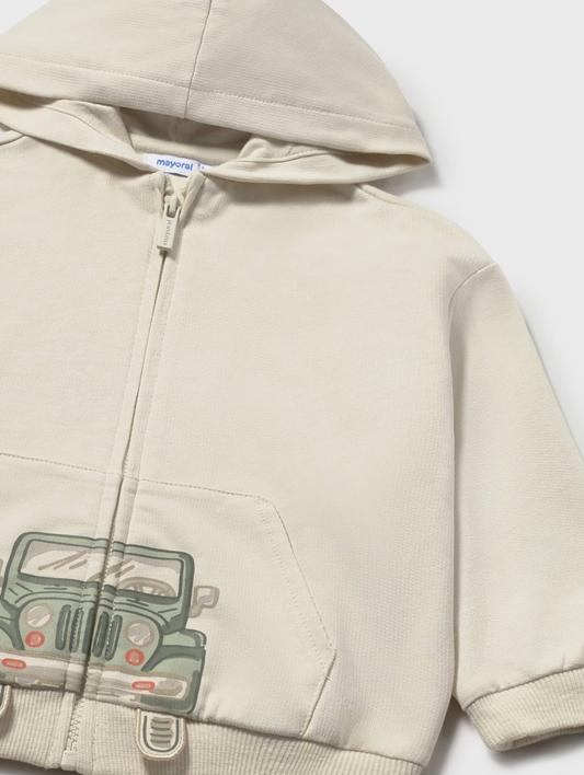 Mayoral boys' country adventure zip-up hoodie — close-up detail showing the vintage green 4x4 jeep graphic with red headlights split across the zip, kangaroo pocket seam and oatmeal cotton-blend sweatshirt texture