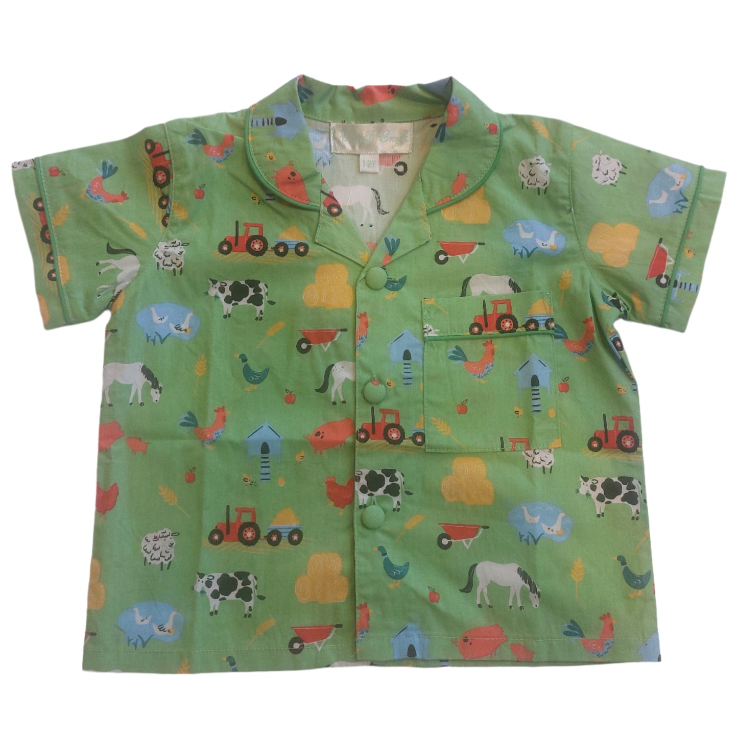 Green children's shirt with farm animal and tractor pattern. KID'S FARMYARD SHORTS & TOP PYJAMA SET - 3 SIZES | POWELL CRAFT