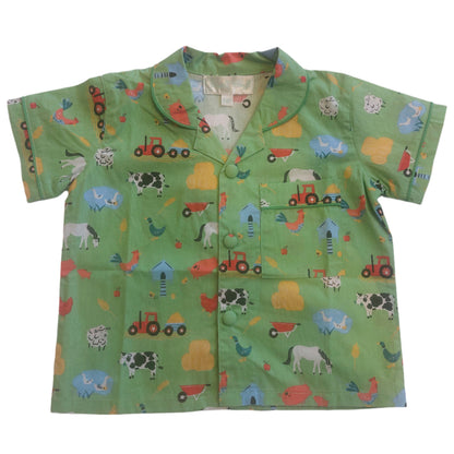 Green children's shirt with farm animal and tractor pattern. KID'S FARMYARD SHORTS & TOP PYJAMA SET - 3 SIZES | POWELL CRAFT
