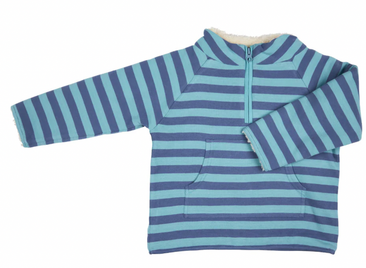 Pigeon Organics Kid's Fleece-Lined Quarter-Zip Top in Breton Stripe Velvet Blue — front flat-lay on white background; long-sleeve pullover top in sky blue and slate/denim blue horizontal Breton stripe organic cotton; high funnel/stand collar with cream/natural fleece lining visible at the top of the collar; quarter-zip front closure with a teal/sky blue zip pull running from the collar down to the chest; front kangaroo-style pouch pocket at the hem; long sleeves with flat cuffs; stripes run horizontally acr