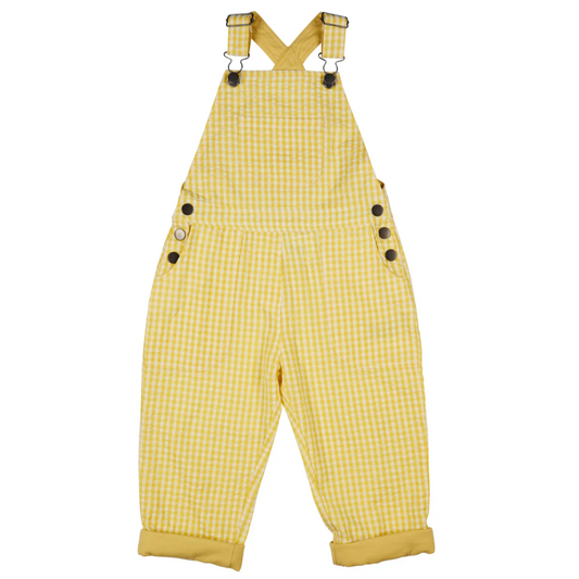 Yellow checkered overalls with black buttons. KID'S ORGANIC COTTON WORKER DUNGAREEES - YELLOW CHECK | PIGEON ORGANICS