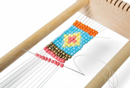 Beaded loom with colorful pattern. KID'S WOODEN BEAD WEAVING LOOM | BIGJIGS
